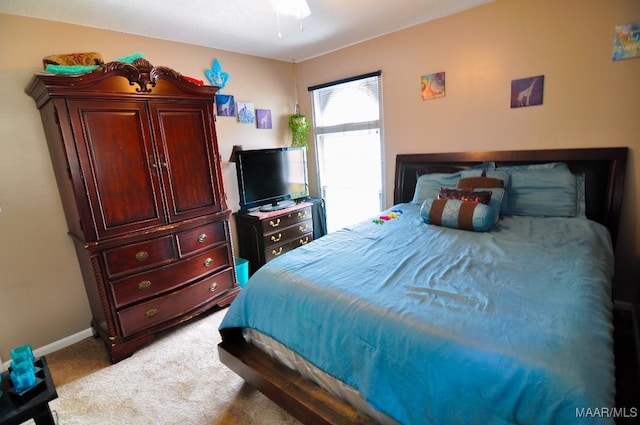 bedroom featuring carpet flooring