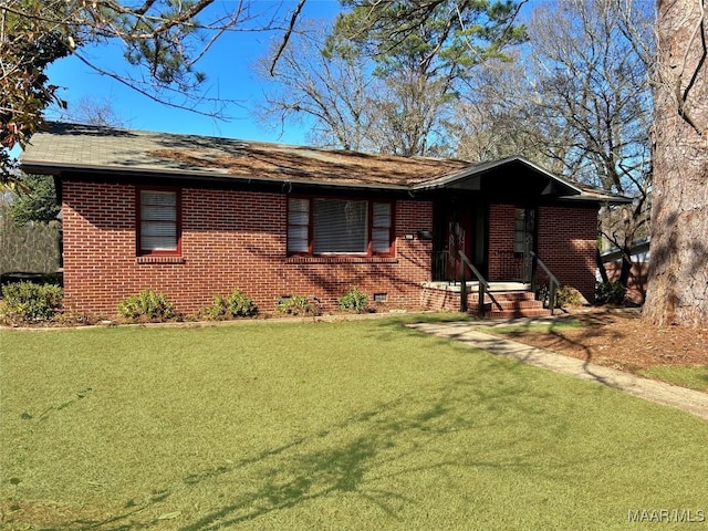 ranch-style house with a front lawn