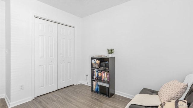 living area with light hardwood / wood-style floors