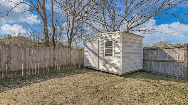 view of outbuilding with a lawn