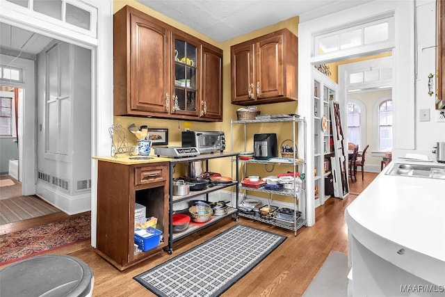 kitchen featuring sink and light hardwood / wood-style flooring