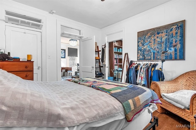 bedroom with crown molding