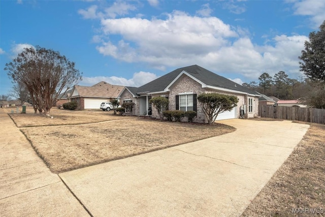 ranch-style house featuring a garage