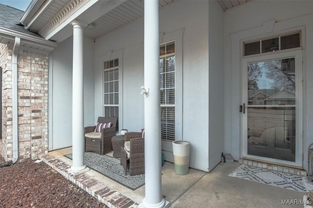 entrance to property featuring a porch