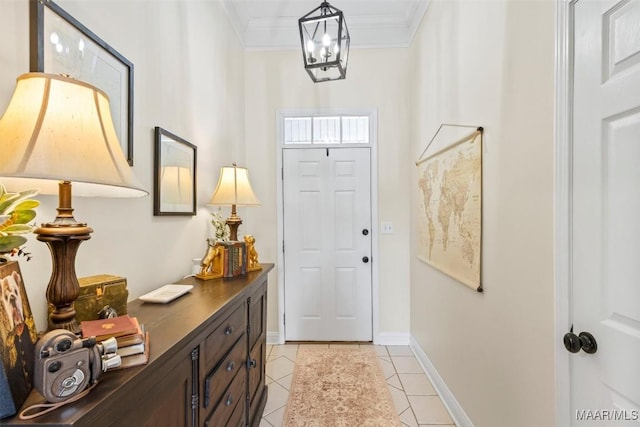 doorway to outside with light tile patterned floors, crown molding, and a notable chandelier