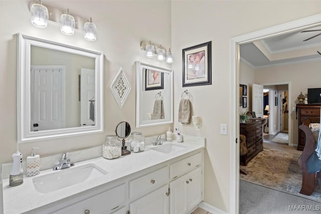 bathroom featuring vanity and crown molding