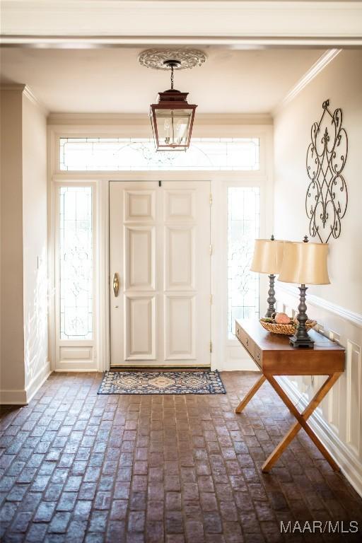 entrance foyer with ornamental molding