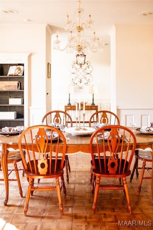 dining room with a chandelier