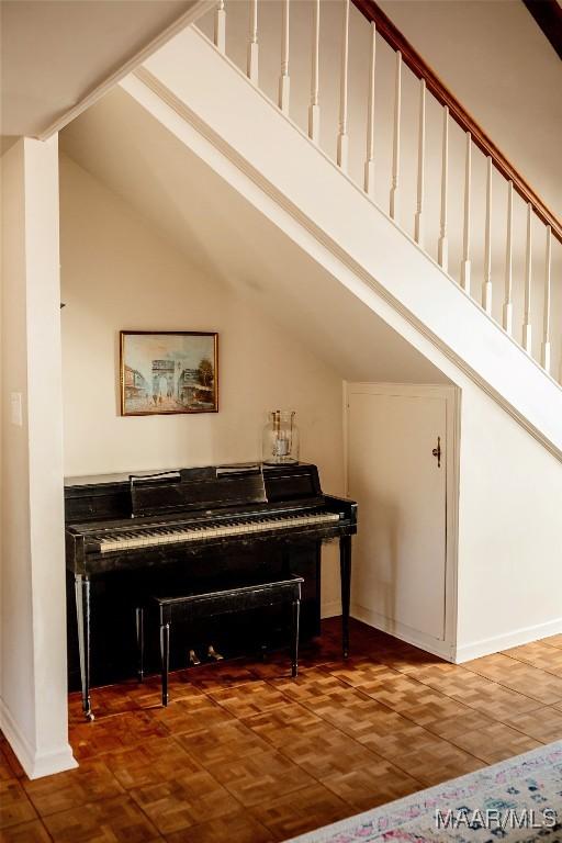 misc room with vaulted ceiling