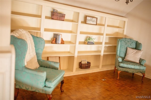 living area with parquet floors