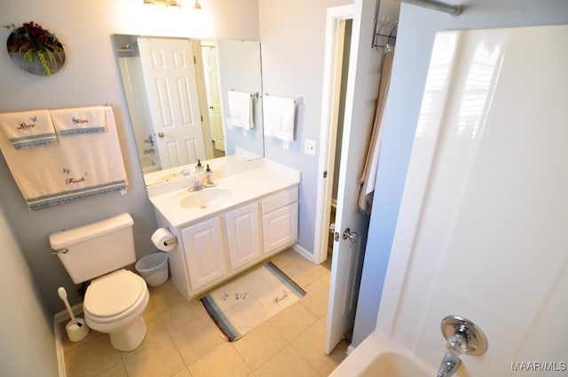 full bathroom featuring shower / tub combination, vanity, tile patterned floors, and toilet