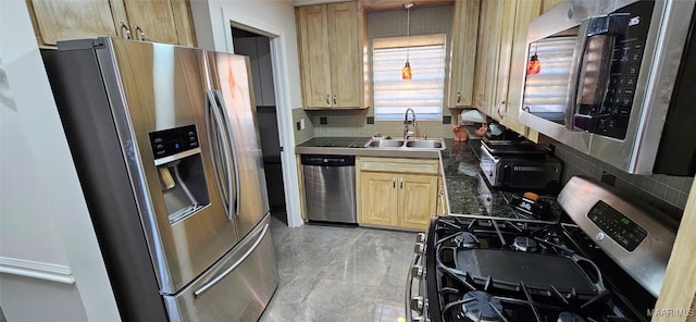 kitchen with stainless steel appliances, tasteful backsplash, sink, and light brown cabinets