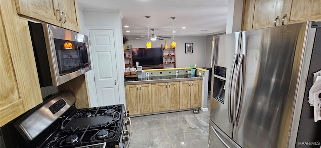 kitchen with light brown cabinetry, crown molding, hanging light fixtures, appliances with stainless steel finishes, and ceiling fan