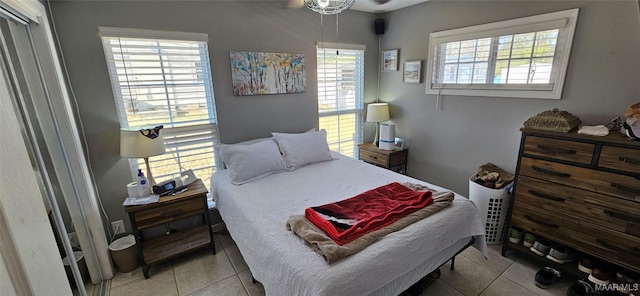 bedroom featuring light tile patterned floors