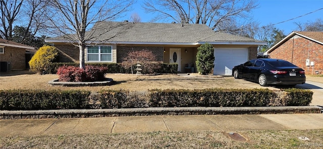 single story home with a garage