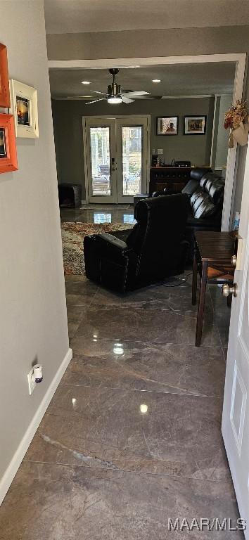 living room with french doors and ceiling fan