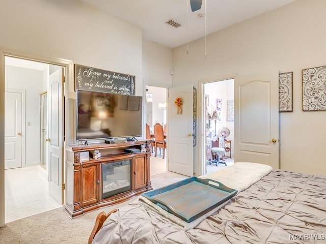 bedroom with light carpet