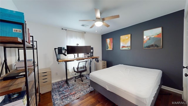 bedroom featuring dark wood-type flooring