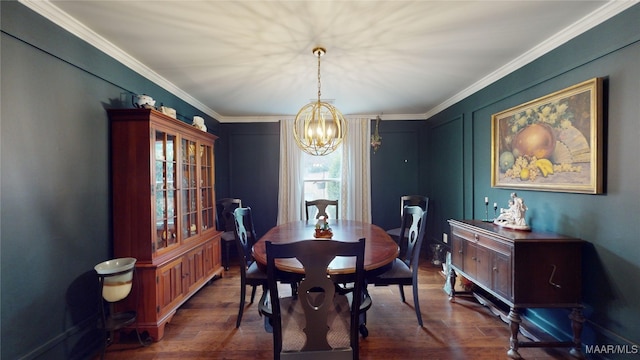 dining room featuring ornamental molding, dark hardwood / wood-style floors, and a notable chandelier