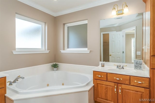 bathroom with vanity, a bath, and ornamental molding