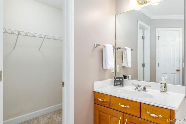 bathroom featuring vanity and crown molding