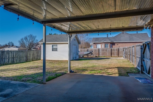 view of patio with a shed