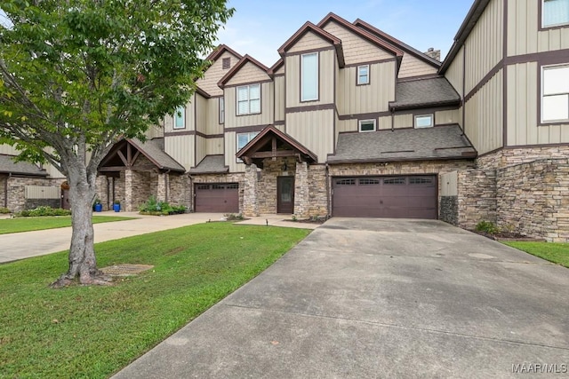 view of front of property featuring a garage and a front yard