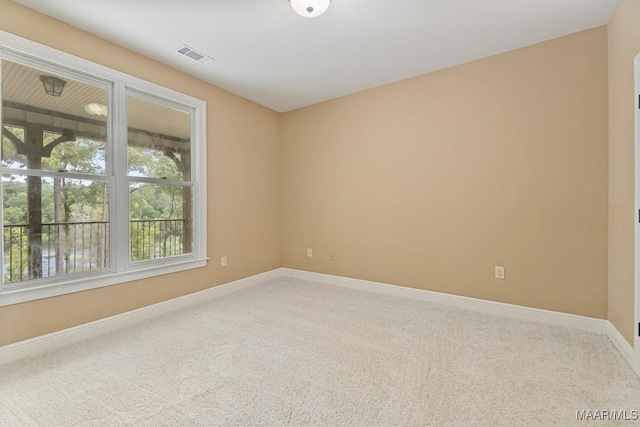 view of carpeted spare room