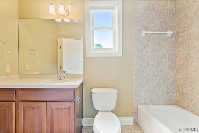 full bathroom featuring tiled shower / bath, vanity, toilet, and tile patterned flooring