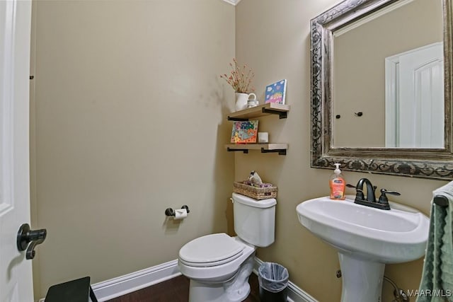 bathroom featuring toilet