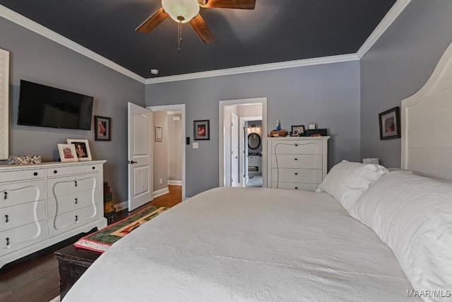 bedroom featuring crown molding, ceiling fan, and dark hardwood / wood-style flooring