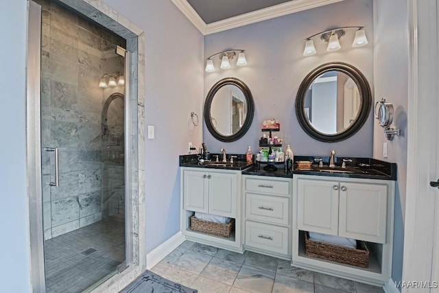 bathroom with ornamental molding, vanity, and a shower with shower door