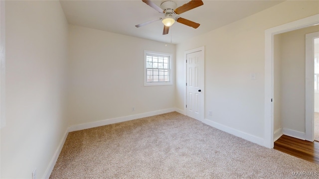 unfurnished bedroom with carpet, ceiling fan, and a closet