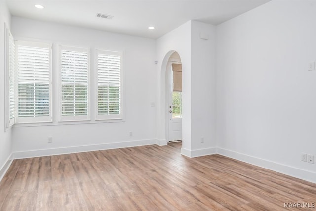 empty room with light wood-type flooring