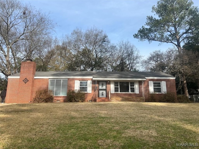 single story home featuring crawl space, a chimney, a front lawn, and brick siding