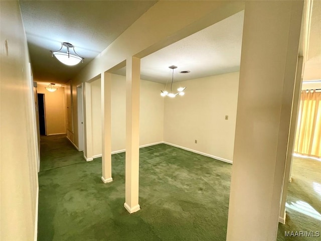 basement with dark carpet