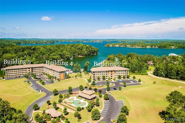 birds eye view of property with a water view