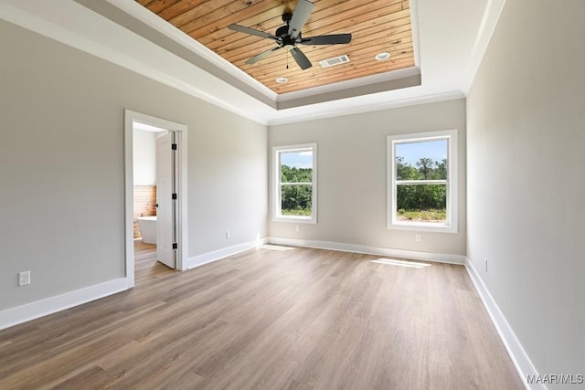 116 Madix Dr, Eclectic, AL 36024 - empty room featuring wooden ceiling, a raised ceiling, wood finished floors, a ceiling fan, and ornamental molding