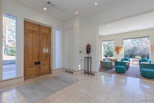 entrance foyer featuring light tile patterned floors