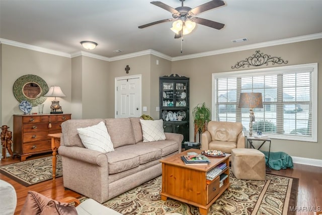 living room featuring crown molding, ceiling fan, and hardwood / wood-style floors