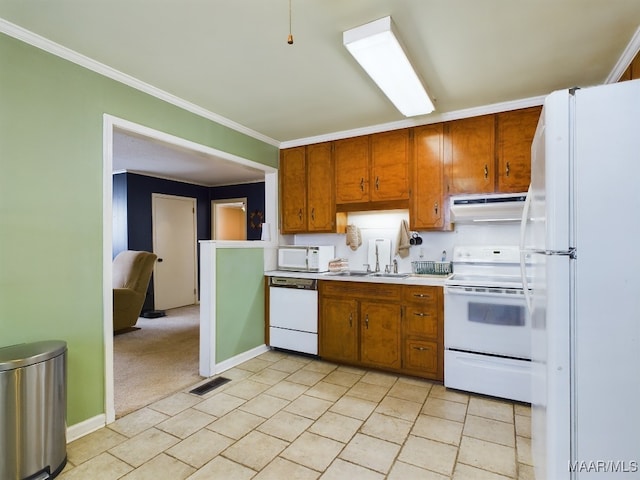 kitchen with extractor fan, sink, ornamental molding, light carpet, and white appliances