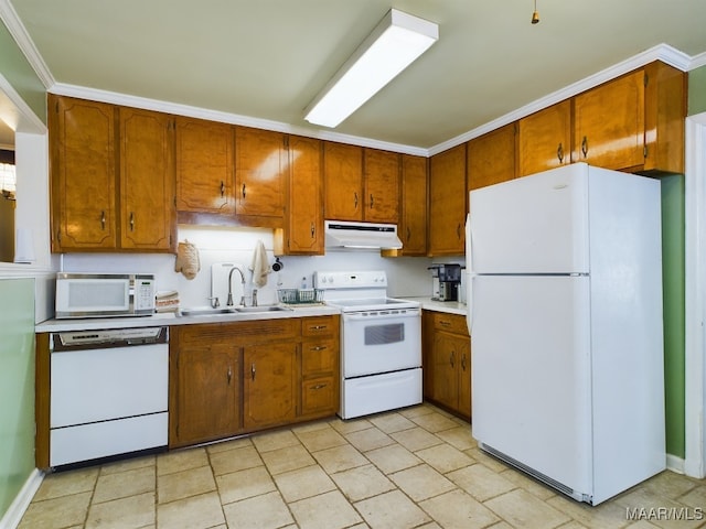 kitchen with sink and white appliances