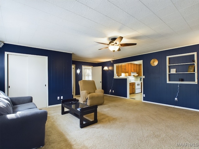 living room with light colored carpet and ceiling fan