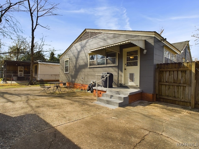 view of front of home with a patio area