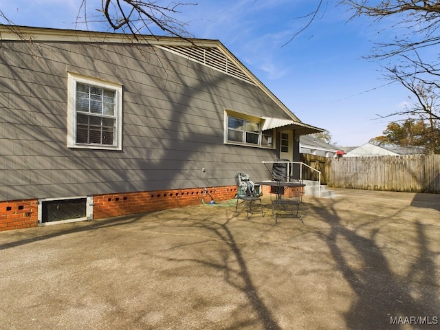 view of home's exterior featuring a patio