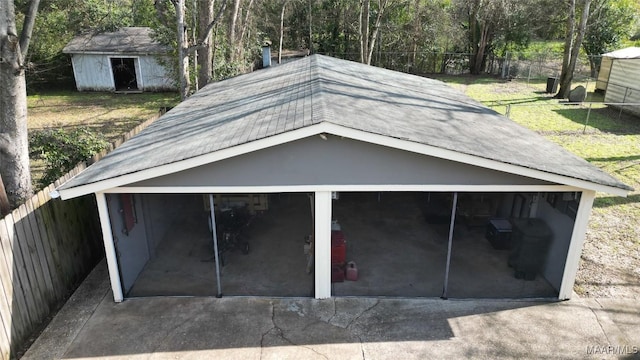 garage with a yard