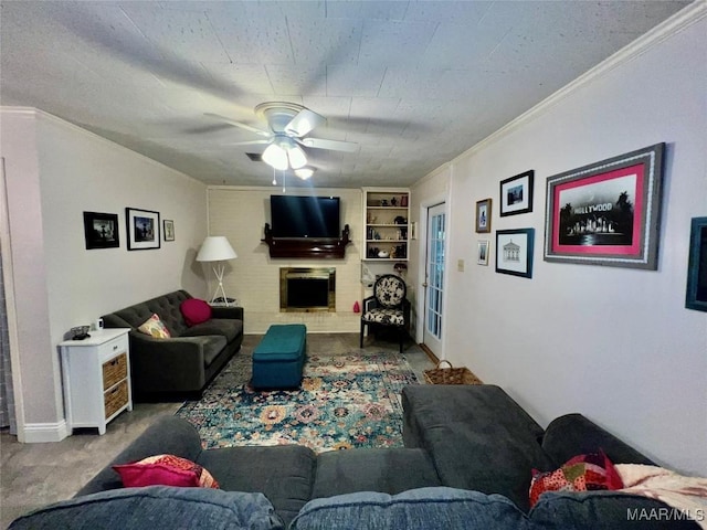 living room with a brick fireplace, ceiling fan, and carpet flooring