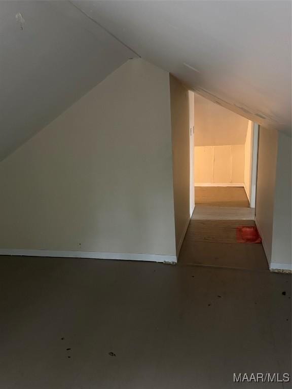 bonus room featuring lofted ceiling