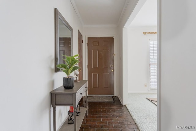 doorway to outside with crown molding