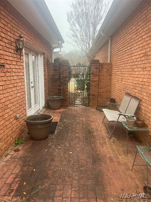 view of patio featuring french doors